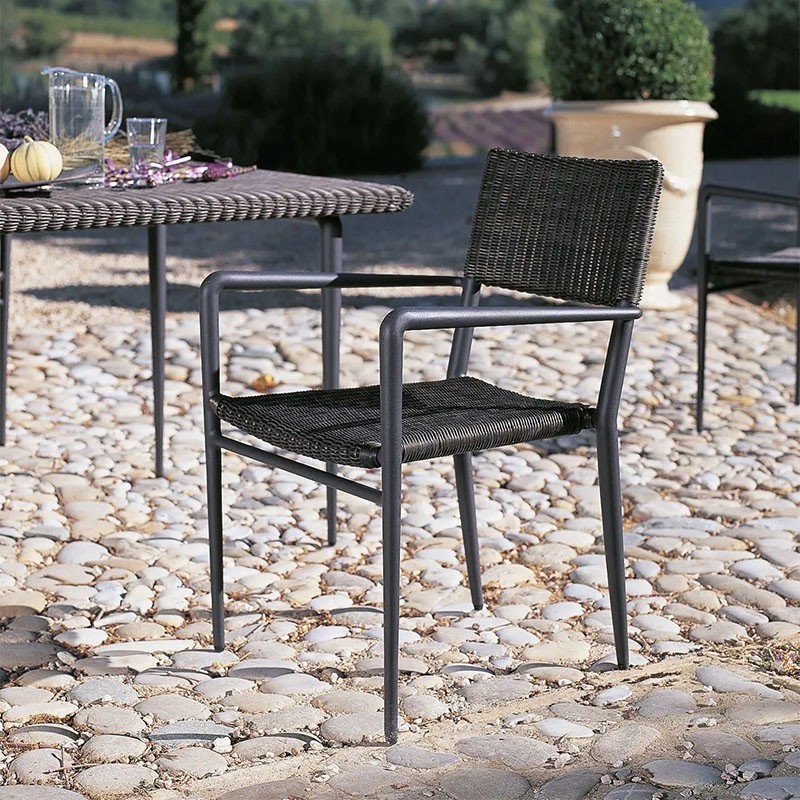 Experience stackable Unopiù Chair with armrests